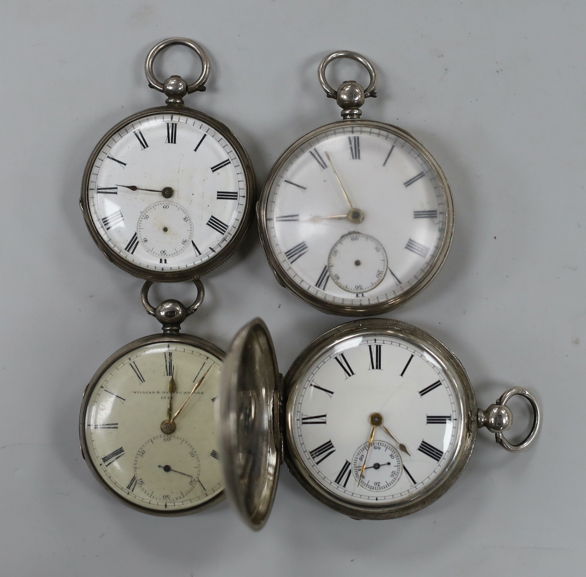 A late 19th century silver Waltham keywind hunter pocket watch, a 19th century silver open faced keywind pocket watch by Joseph Pentington, Swerpool, one other by Purves of Middleton and one other later Swiss white metal